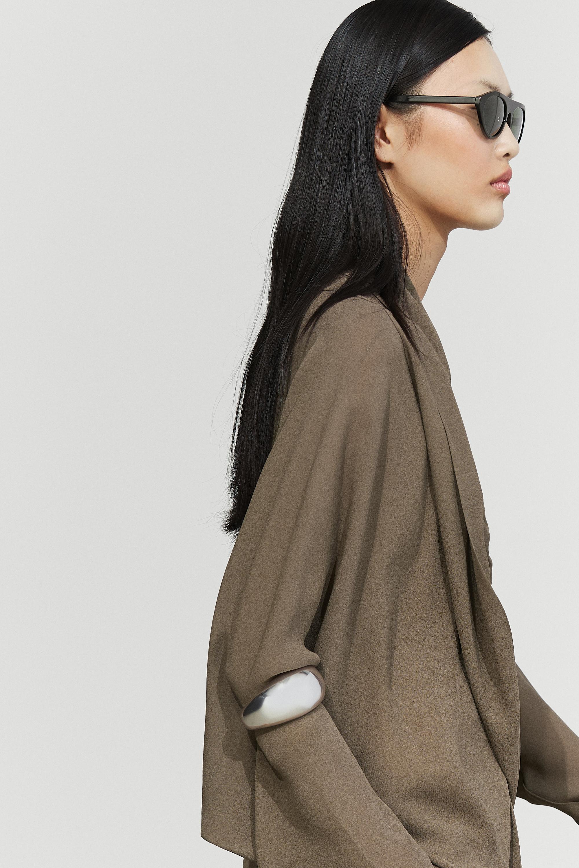 Flowy surplice draped neckline shirt